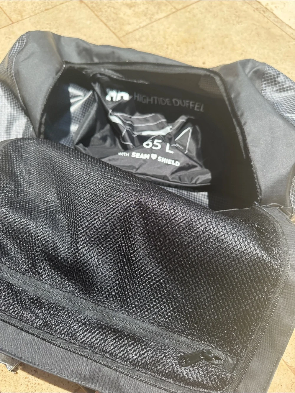 Helly Hansen Black High Tide 65 L Duffel Bag - HH Logo Travel Bag